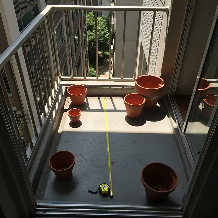Urban balcony with sun and shade areas for container gardening