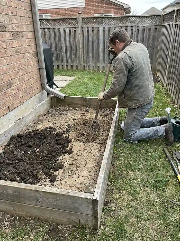 Ignoring Drainage? 5 Squeezing waterlogged brownie batter soil from bottom of garden container