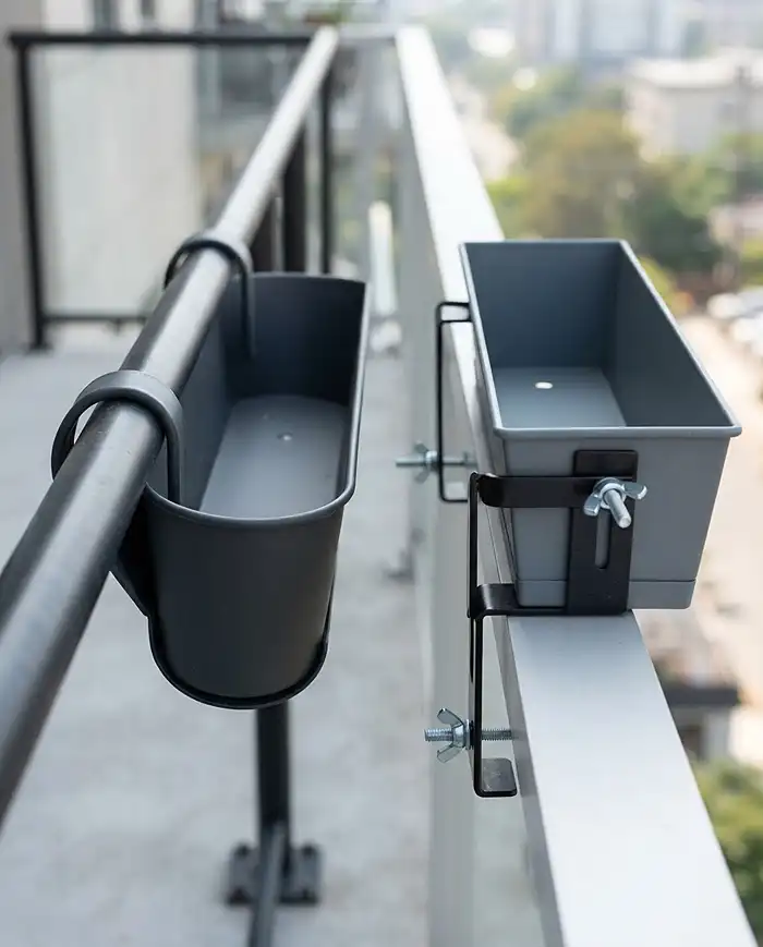 Hanging Planters for Balcony Railing That Save Space 2 Saddle planter draped over a round railing beside a clamped adjustable bracket box showing two mounting styles