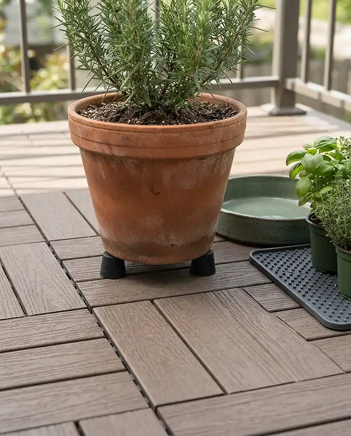 Renter Friendly Balcony Flooring Under Planters 4 pot feet lifting herb containers off balcony flooring for airflow